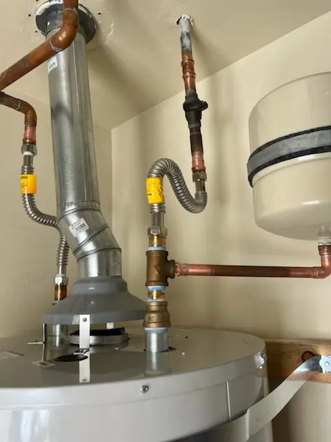 Water heater installation and plumbing repair in West London